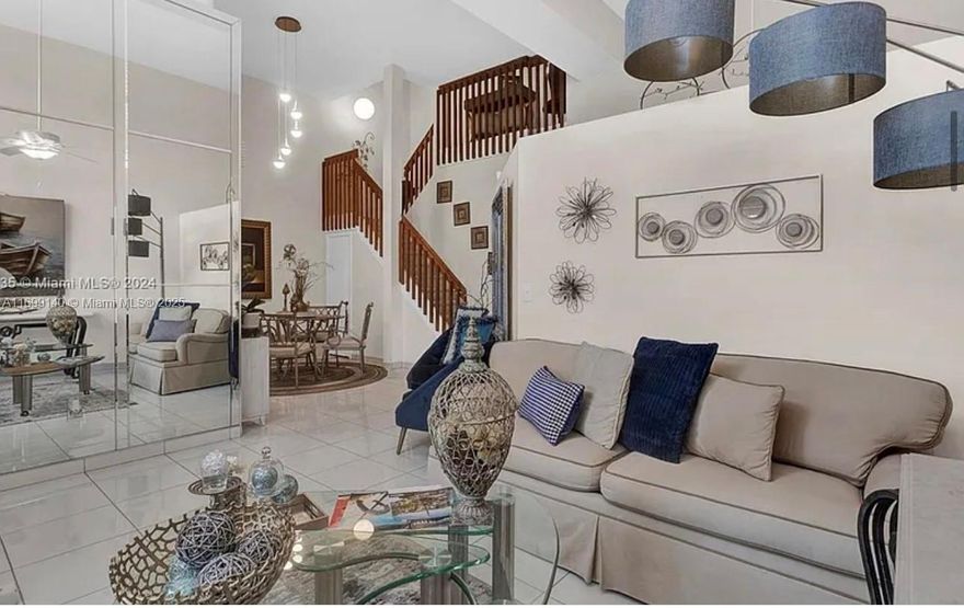 REDUCED price for prompt sale! Bring your offers. Lovely, spacious, remodeled townhouse w/ screened terrace. Close to community pool & jacuzzi.  Tiled floor in all social areas & bathrooms. Wood floor in master bdrm. & 2nd floor. 2 bdrooms w/ seating area on second floor. Modern kitchen w/ all stainless-steel appliances & granite countertops in kitchen & bthrms. Garage floor w/ Epoxy paint.  Master suite in ground floor w/garden view. Impeccable property full of charm and ready to move in.  It's well located next to I-75.  Lots of shopping, entertainment, restaurants, parks, w/in short driving distance. Association $350 includes: water pressure cleaning of the roof, building, driveway & painting. Wi-Fi, Cable TV and alarm. , general maintenance, 24/7 security, and guard gated community.