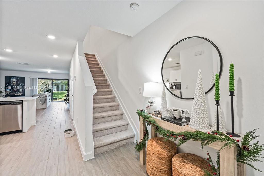 Photo of 6007 Woods Edge Cir #6007, Riviera Beach, FL 33410 (MLS # A11491385)