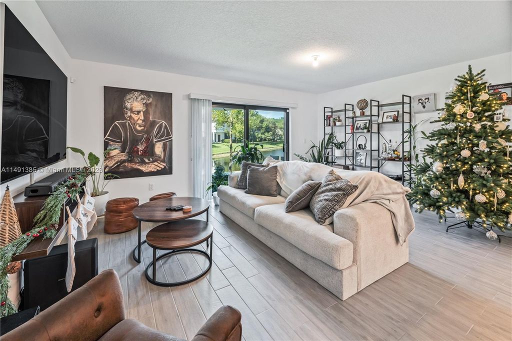 Photo of 6007 Woods Edge Cir #6007, Riviera Beach, FL 33410 (MLS # A11491385)