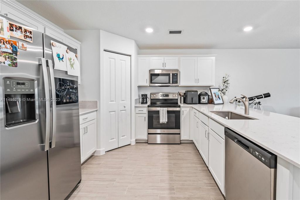 Photo of 6007 Woods Edge Cir #6007, Riviera Beach, FL 33410 (MLS # A11491385)