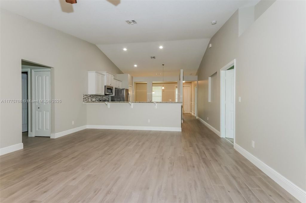 Photo of 971 SW Mccomkle Ave, Port Saint Lucie, FL 34953 (MLS # A11775768)