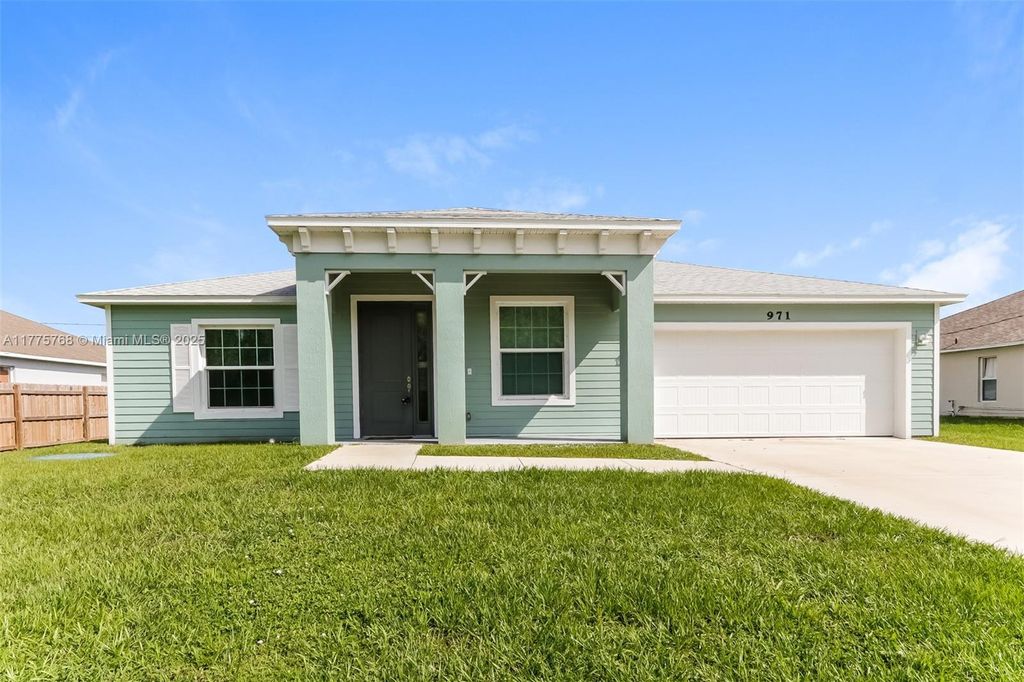 Photo of 971 SW Mccomkle Ave, Port Saint Lucie, FL 34953 (MLS # A11775768)