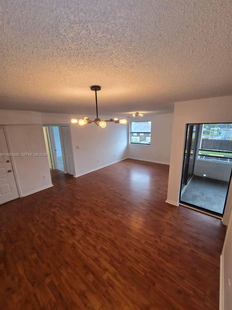 QUATRAINE CONDO III - Residential Lease