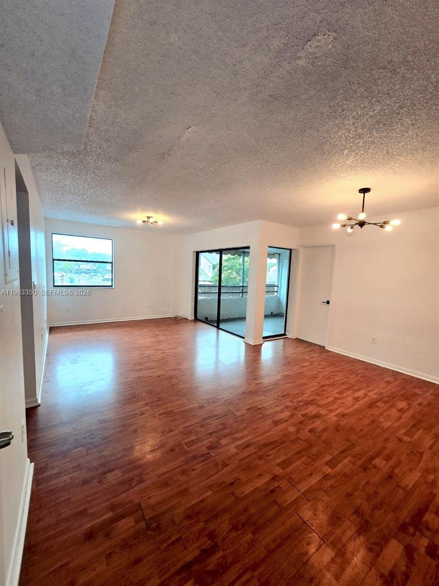 QUATRAINE CONDO III - Residential Lease