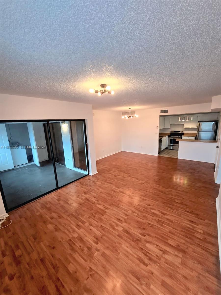 QUATRAINE CONDO III - Residential Lease