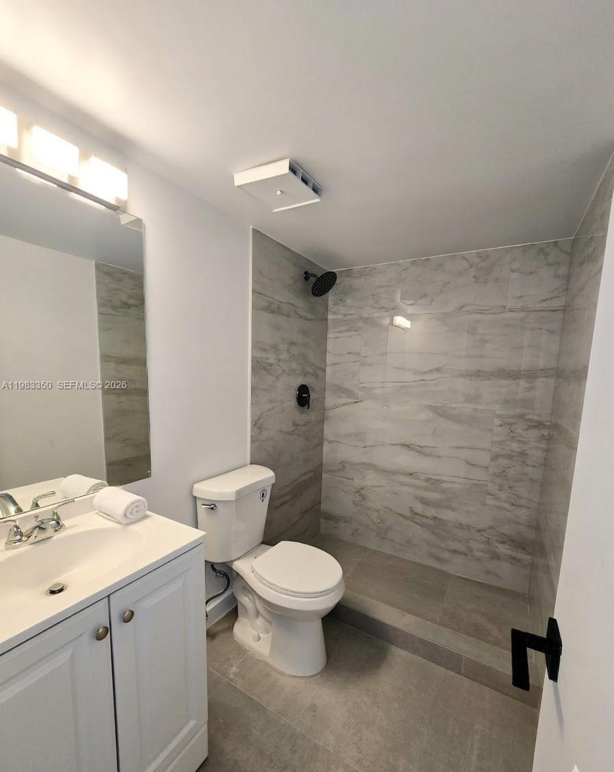 QUATRAINE CONDO III - Residential Lease