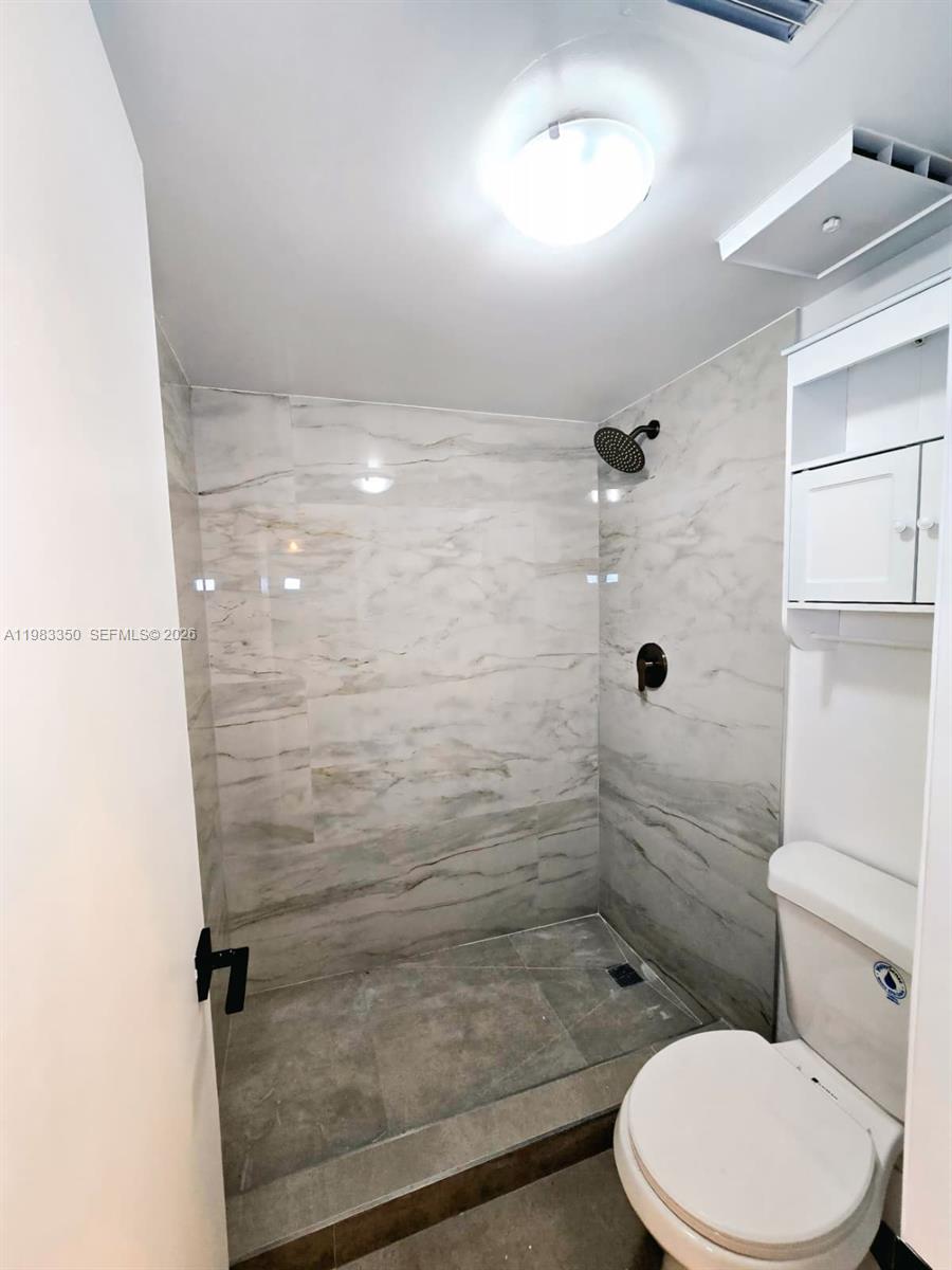 QUATRAINE CONDO III - Residential Lease