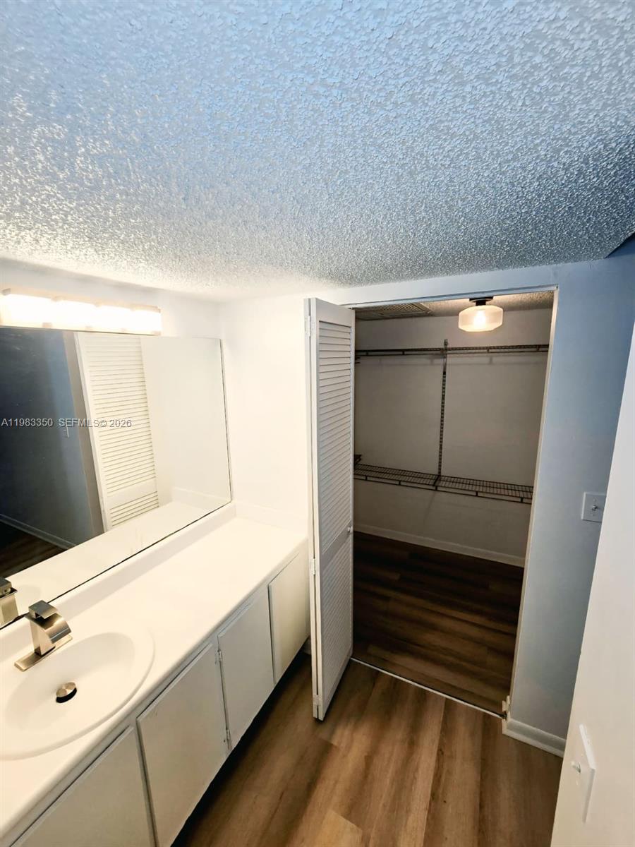 QUATRAINE CONDO III - Residential Lease