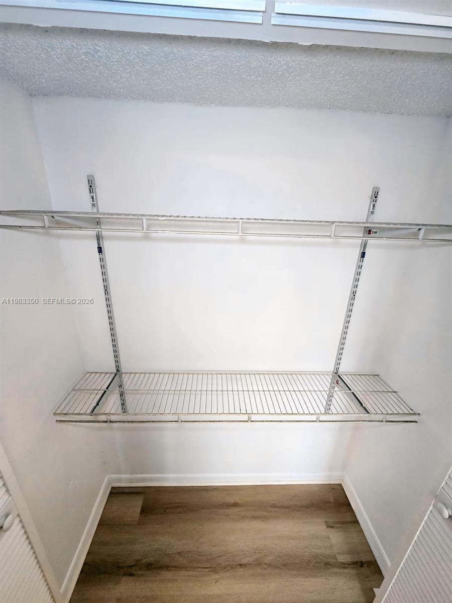 QUATRAINE CONDO III - Residential Lease