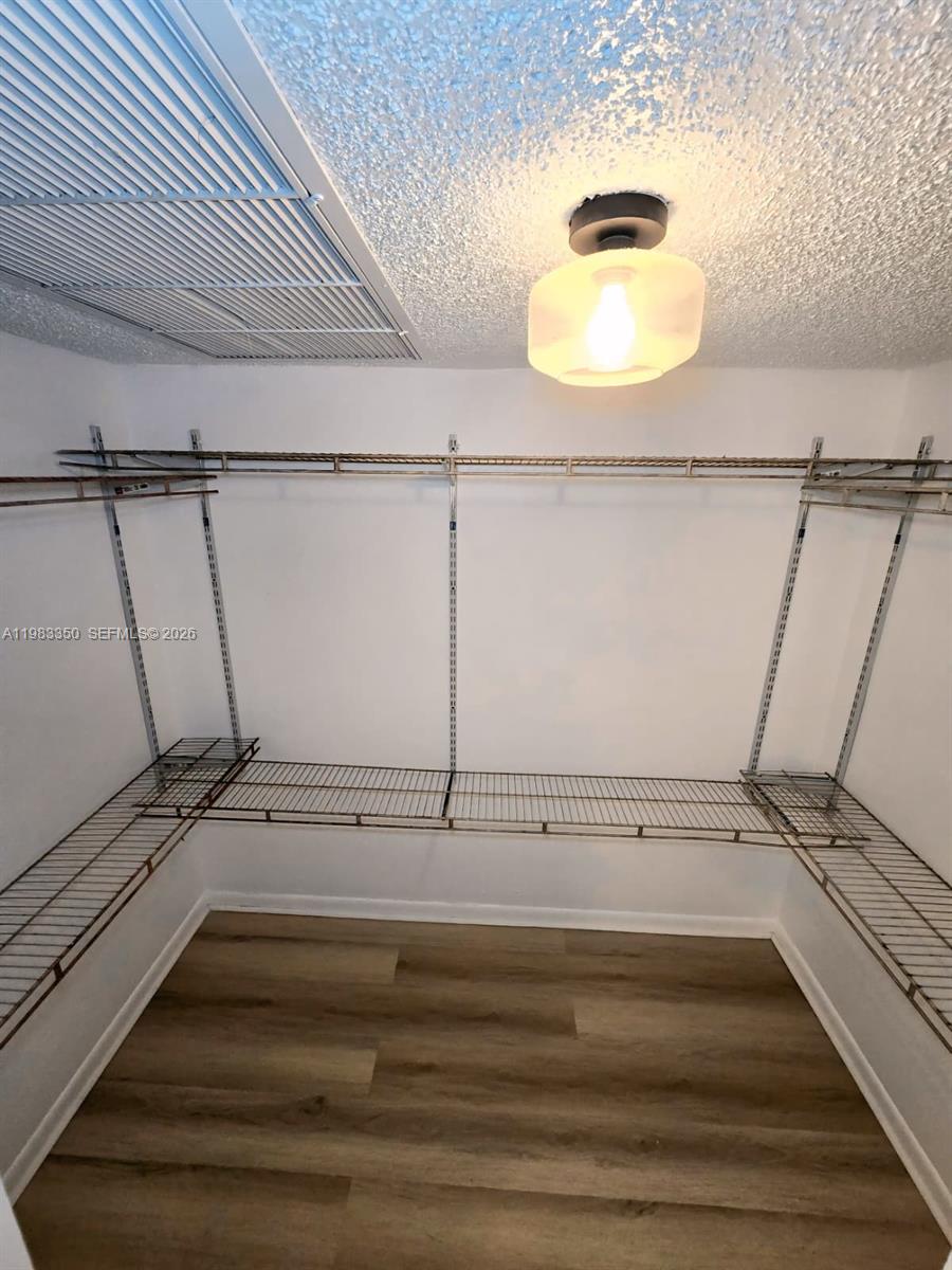 QUATRAINE CONDO III - Residential Lease