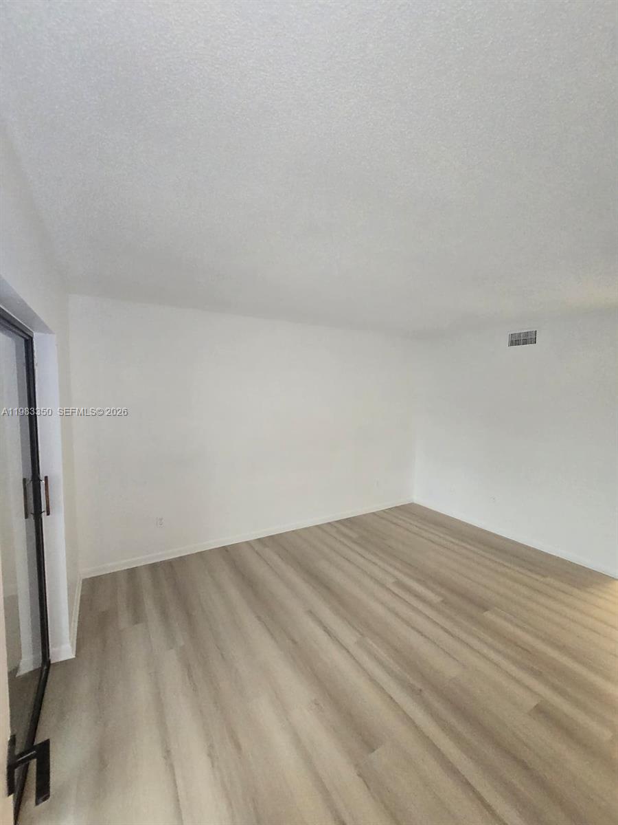 QUATRAINE CONDO III - Residential Lease