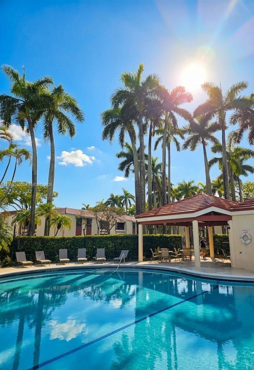 QUATRAINE CONDO III - Residential Lease