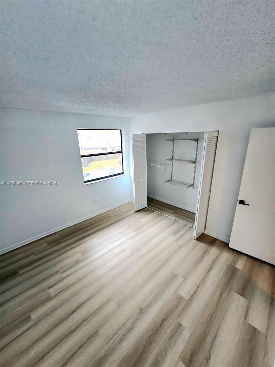 QUATRAINE CONDO III - Residential Lease