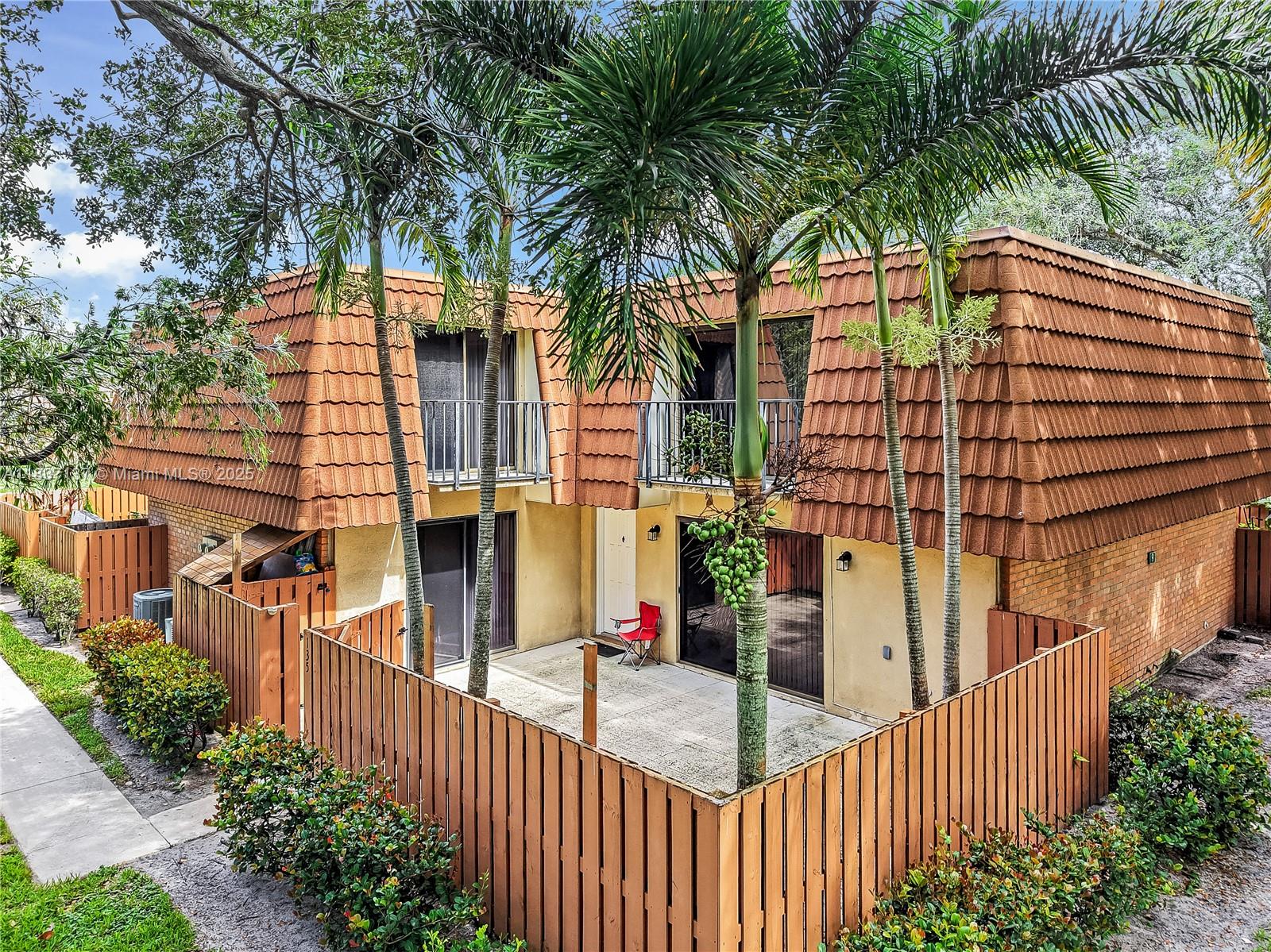 This updated 2 bedroom, 2.5 bathroom townhouse in the heart of West Palm Beach offers an open-concept layout with a modern kitchen featuring stainless steel appliances, along with updated countertops. The main level includes tile flooring and a convenient laundry area, while the upstairs primary suite includes a ample closet and laminate flooring. Recent improvements include a newer AC system. The fenced patio provides outdoor privacy. This property is move-in ready and located near local amenities and major routes.