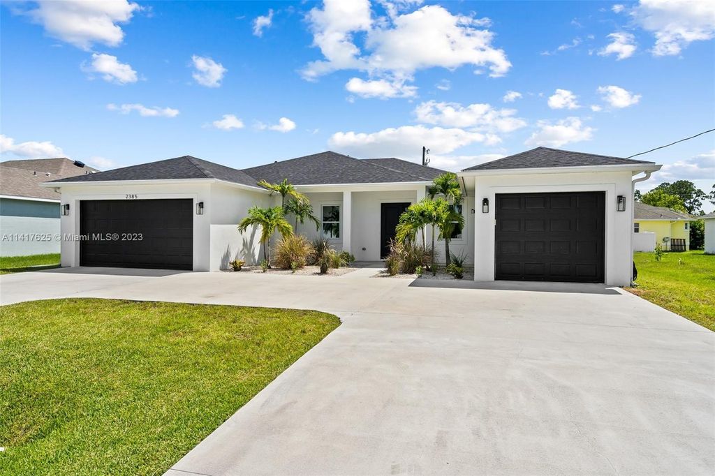 Photo of 2385 SW Import Dr, Port Saint Lucie, FL 34953 (MLS # A11417625)