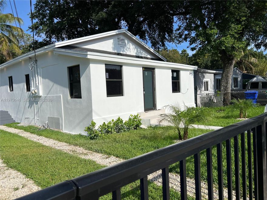 ATTENTION! Investors and Buyers seeking a primary residence with built-in income potential. Fully renovated, move-in ready property in Miami's rapidly evolving 33127 area, just minutes from Wynwood and the Design District.
The main residence features 3 bedrooms and 2 bathrooms with a modern open layout, brand-new kitchen with stainless steel appliances, porcelain tile flooring throughout, impact windows and doors, and a new roof-offering the feel of new construction. What truly sets this property apart is the independent second living unit, featuring a private entrance and separate electric meter , ideal for generating approximately $2,000/month in rental income.
Perfect for: Buyers looking to significantly offset their monthly mortgage; Multi generational living; Flexible use as guest suite or long-term rental.
Located in a duplex-zoned area, offering additional future development potential. ''No HOA fees and restrictions''
A unique opportunity to own a versatile property in one of Miami's most dynamic and growing neighborhoods.
photos are virtually staged to show the home's potential.