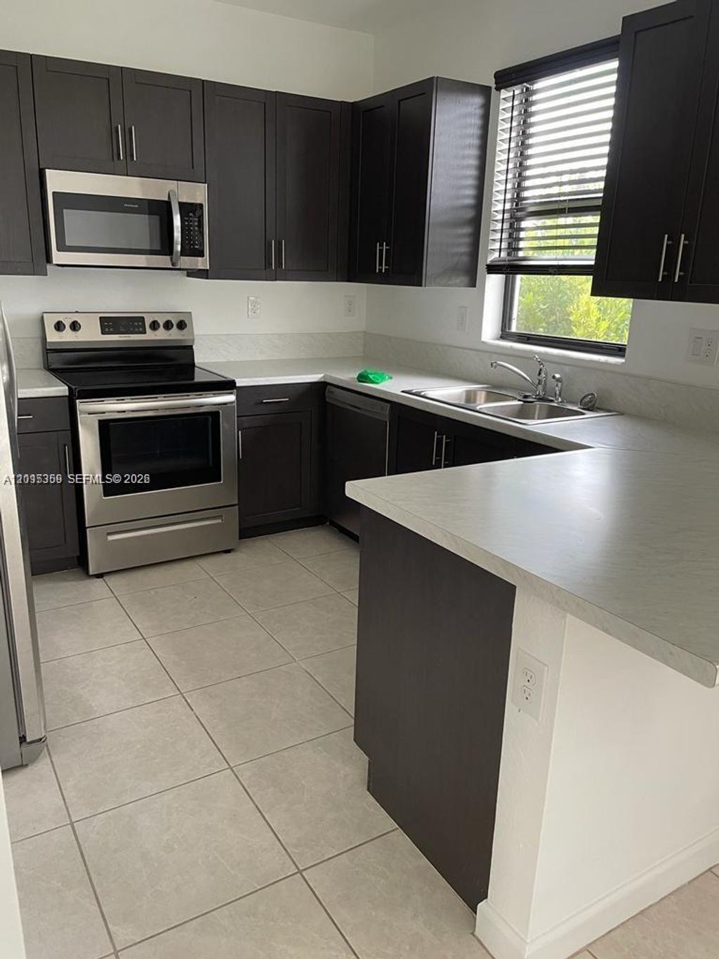 Photo of 5892 Mustang Mnr #5892, Davie, FL 33314 (MLS # A12015359)