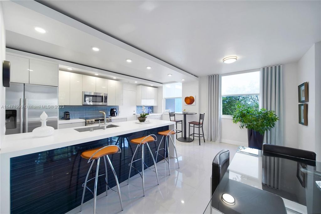 Photo of 4200 Hillcrest Dr #411, Hollywood, FL 33021 (MLS # A11471990)