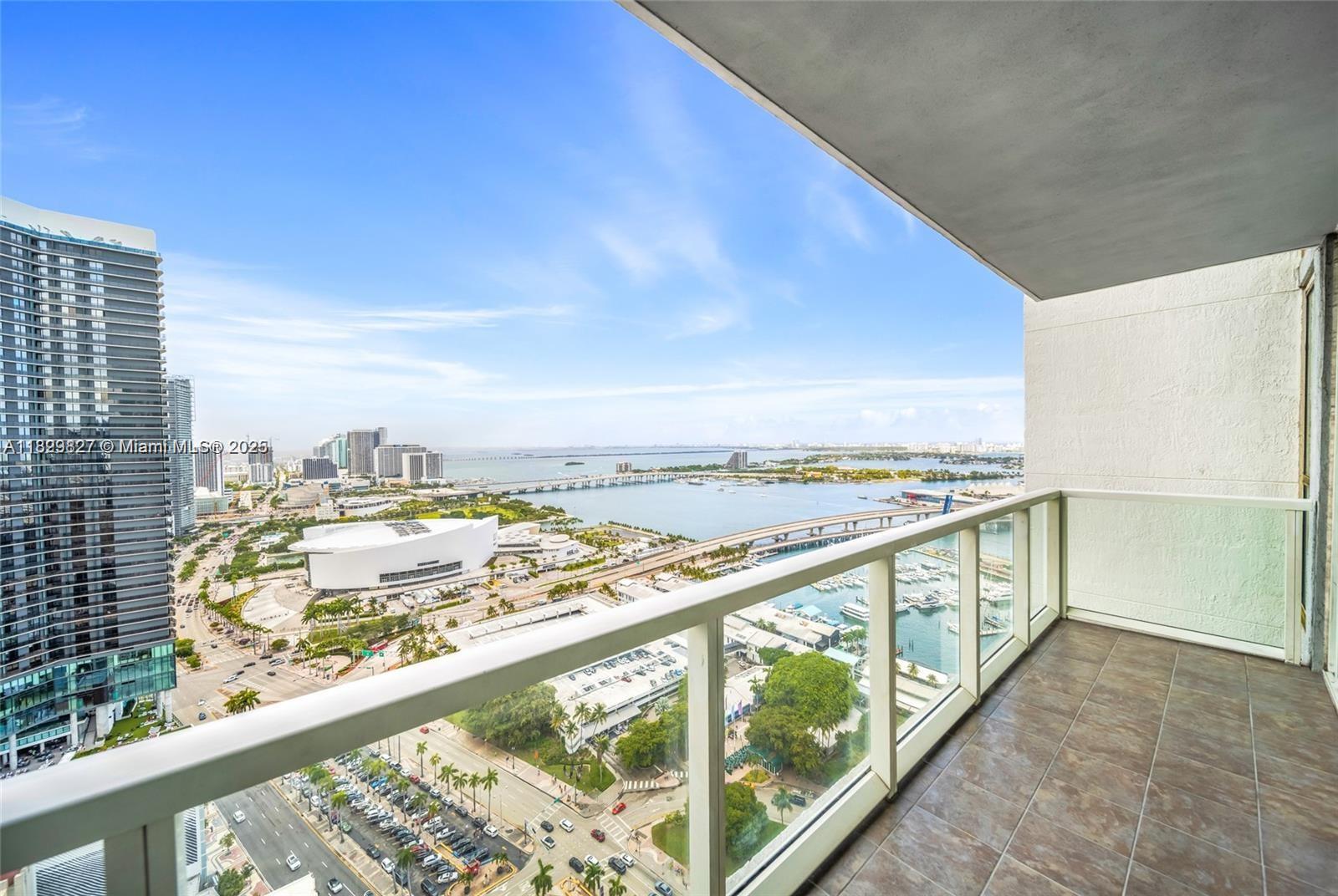 No need to look any further! Live in the heart of Downtown Miami at Vizcayne North, 244 Biscayne Blvd. Spacious 1BD/1BA with floor-to-ceiling windows, private balcony, granite countertops, stainless steel appliances & in-unit laundry. Enjoy city & bay views in a full-service building with 3 pools, fitness center, spa, theater, clubhouse & 24/7 security. Stable condo with HOA collecting reserves. Prime walkable location steps from Miami Worldcenter, Bayside, Bayfront Park, Kaseya Center & Brightline; minutes to Brickell, Wynwood & Design District. Next to the future Waldorf Astoria Miami, the city’s tallest and ultra-luxury tower, adding long-term value. Short-term rentals allowed (30 days, 12 times/yr). Perfect for living or investment.