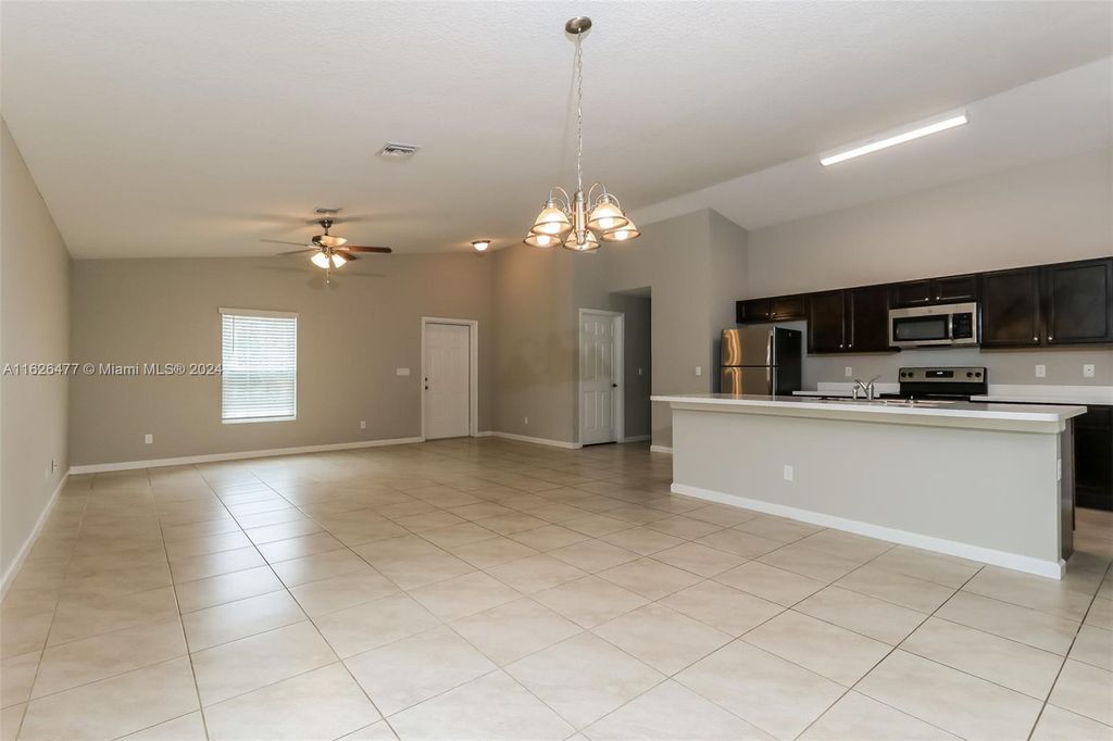 Photo of 1257 SW Century Ave, Port Saint Lucie, FL 34953 (MLS # A11626477)