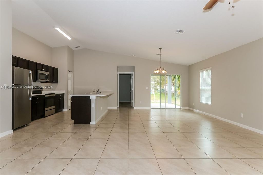 Photo of 1257 SW Century Ave, Port Saint Lucie, FL 34953 (MLS # A11626477)