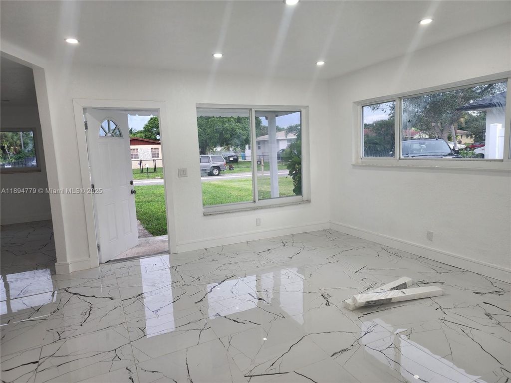 Photo of 418 NW 8th Ave, Boynton Beach, FL 33435 (MLS # A11894779)