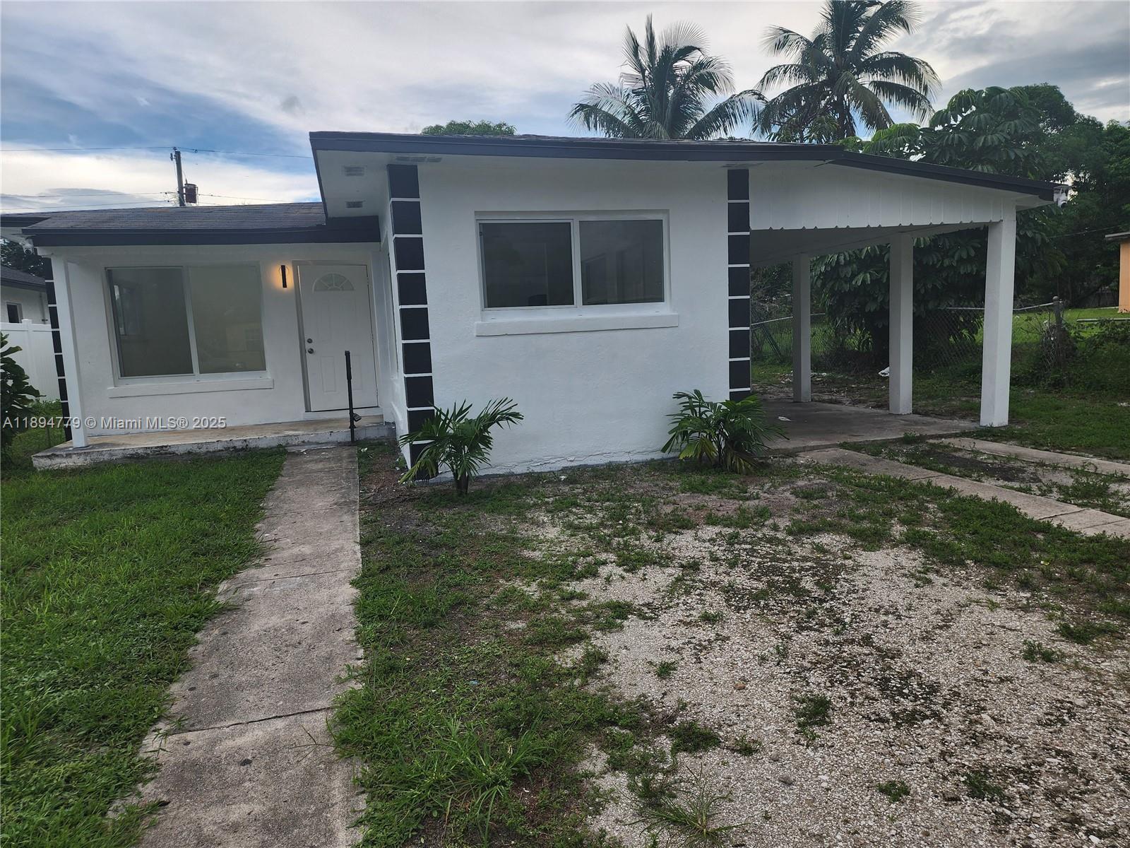 View photos, virtual tours, details... 418 NW 8th Ave