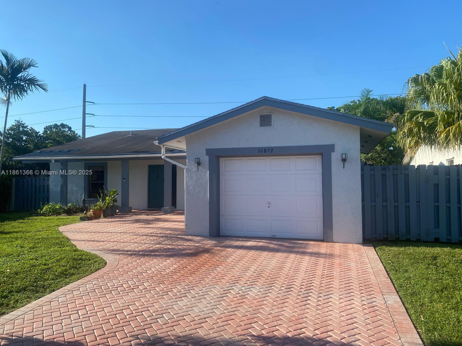 Discover this beautiful 3-bedroom, 2-bath home with an additional bedroom in a converted garage, located in the highly sought-after Bonaventure Lakes community in Weston.Offering spacious living and peaceful surroundings, this home is a true gem—perfect for families or anyone looking to enjoy the Weston lifestyle. Located in a top-rated A+ school district, this property also benefits from low annual HOA fees, access to the Bonaventure Town Center Club (membership required), where you can enjoy resort-style amenities including pools, fitness center, tennis, and more. Enjoy resort-style amenities.An incredible opportunity to own in one of Weston’s most established neighborhoods—schedule your showing today!