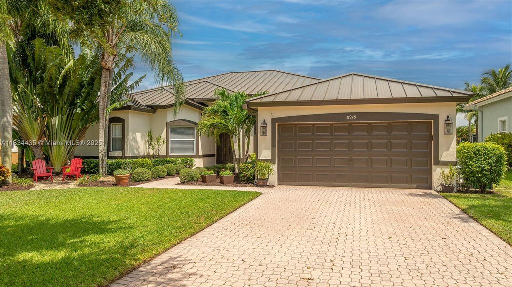 Photo of 10975 NW 56th Ct, Coral Springs, FL 33076 (MLS # A11834435)