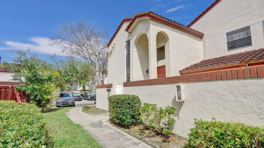 This spacious corner townhouse offers soaring two-story ceilings and modern grey laminate flooring throughout, creating an open and airy feel. The main bedroom is conveniently located on the first floor and features a huge walk-in closet, while the kitchen boasts stainless steel appliances, ample counter space, and a large pantry/storage room. Enjoy two private patios—one off the main bedroom and one off the living room—perfect for relaxing. Additional perks include one assigned parking spot, guest parking, and access to a community pool next to a peaceful lake, all within a gated subdivision for added privacy and security. Condo Assoc has reserves. Qualifies for low down payment financing. Seller will buydown buyer's interest rate for first 2 yrs.