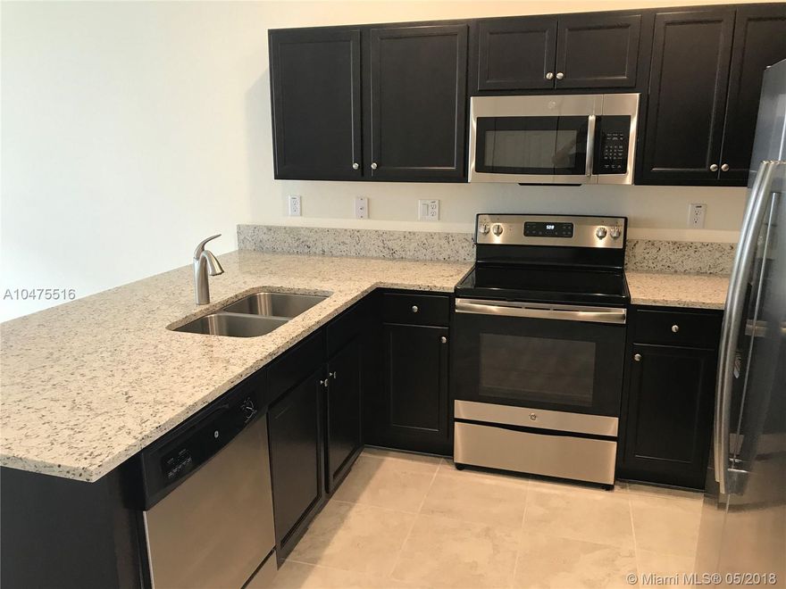 BUILT IN 2017, THE BEST DEAL IN GUARD GATED AQUABELLA! 3 BEDROOMS, 3 FULL BATHS UNIT. 1 CAR GARAGE PLUS 2 CAR PAVED DRIVEWAY. UPGRADED TILES DOWNSTAIRS, GREY WHITE WASHED LAMINATE FLOORS UPSTAIRS. EXTRA SIDE WINDOWS FOR MORE NATURAL LIGHT. QUARTZ COUNTER TOPS, STAINLESS STEEL APPLIANCES AND BIG PANTRY. FULLY FENCED,EXTENDED PAVED BACK PATIO. MASTER BEDROOM WITH TRAY CEILING AND CHANDELIER. 2 MASTER CLOSETS, VANITY WITH DOUBLE SINKS. WASHER & DRYER ON SECOND FLOOR. TANKLESS WATER HEATER.