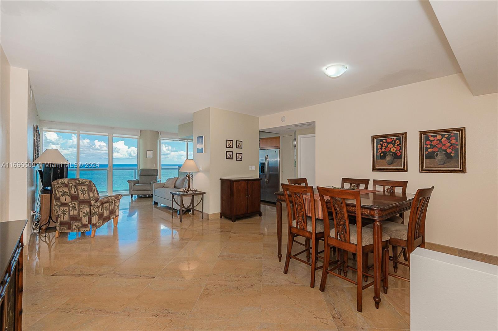 Direct ocean view residence with breathtaking views of the Atlantic Ocean floor to ceiling glass sliding doors from every room, fully furnished. ceramic floors. The building offers exceptional amenities: Beach service, fully equipped gym, racquetball, tennis, sauna, pool, outdoor grill area, business center room with Wi-Fi, 24-hr security/concierge service, valet parking. close to excellent shops, short distance from many great restaurants, shopping centers, schools. exceptional opportunity!