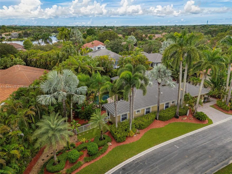 Escape to your own private paradise! This stunning one-story home sits on the community’s largest lot, offering unmatched privacy with a fully fenced yard. Enjoy lush landscaping filled with orchids, a tranquil KOI pond, and a resort-style saltwater pool with brand-new equipment (2025) under warranty. Inside, you'll find elegant marble floors, a renovated principal suite with new ceramic tile, newer roof (2017), and updated A/C with a new compressor (2021). Plus, a two-car garage with a Tesla charger adds the perfect modern touch.