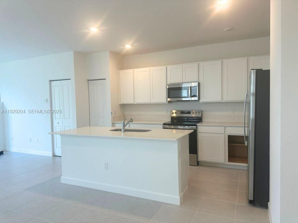 Photo of 393 SE Crossoak Ln, Port St Lucie, FL 34984 (MLS # A11929204)