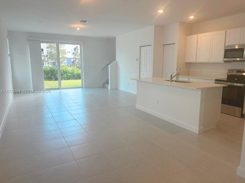 Photo of 393 SE Crossoak Ln, Port St Lucie, FL 34984 (MLS # A11929204)