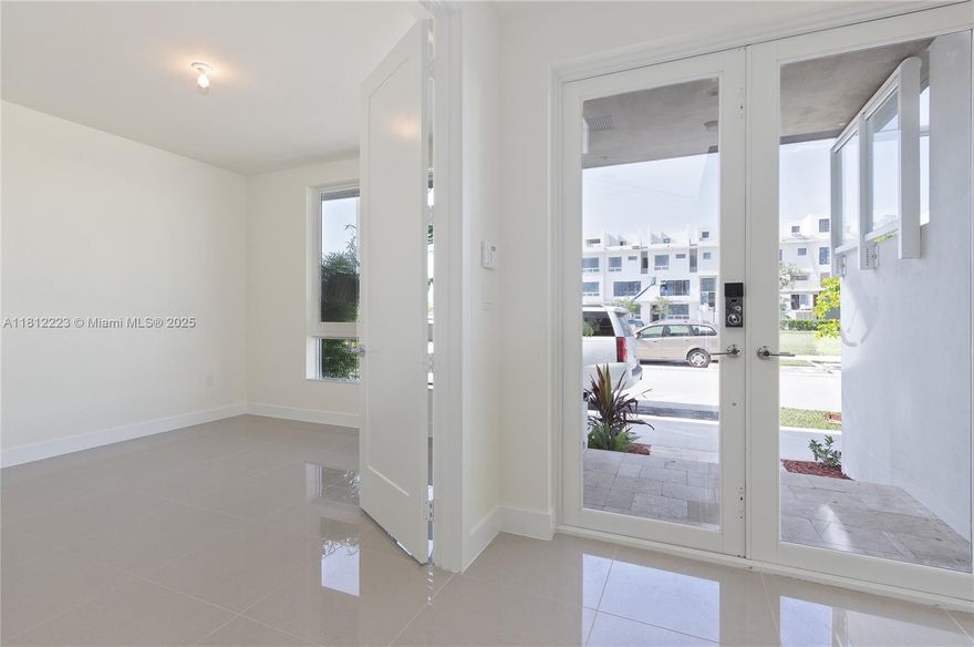The perfect townhome for entertainment! This townhome offers a private elevator & rooftop terrace. Spacious & bright 4 bd 3/2 bath unit is equipped with the most up to date technology. Wi-fi ready and key-less entry. The rooftop terrace is very spacious to entertain and is equipped with a BBQ kitchen, covered & open terrace as well as a half bath. For indoor entertainment, the completely open space enables hosts to enjoy their guests even as they prep in the kitchen. The modern kitchen features a deluxe stainless steel appliance package and quartz countertop. Walk in closets and master bath with dual sinks and glass-enclosed shower are very spacious. Resort style amenities available for you to enjoy! Pets Welcome. $350 NON-REFUNDABLE PET DEPOSIT
