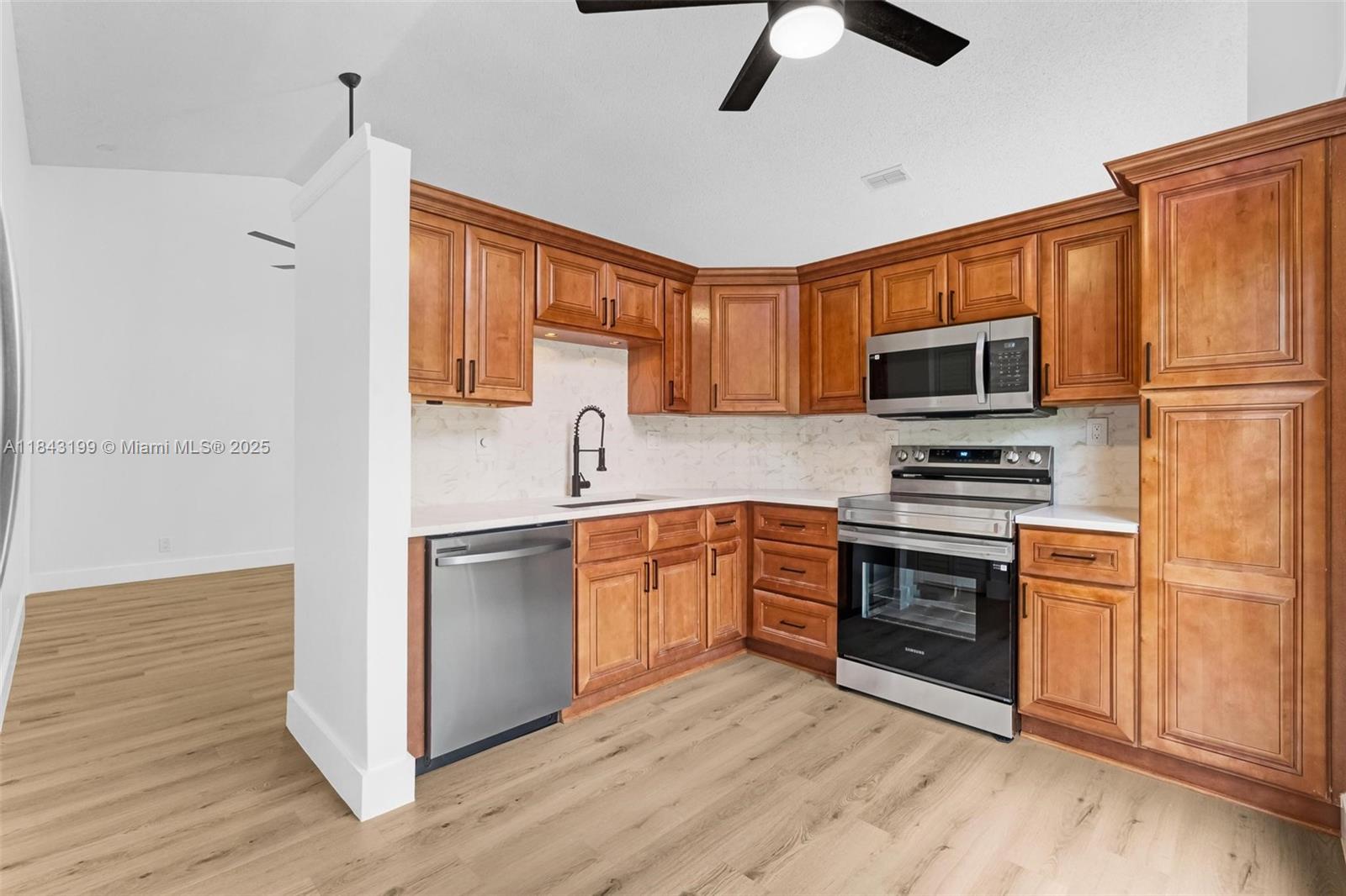 Welcome to your new, move-in ready home! This home features 3 spacious bedrooms, beautifully updated kitchen, new floors throughout, and freshly painted interior. This home is centrally located and minutes from shopping centers and major highways. Seller will contribute $10,000 towards the buyer's closing cost.*
