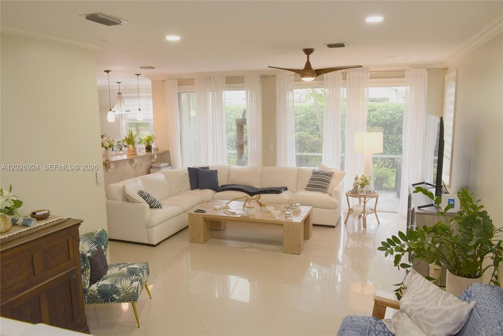 Photo of 11405 NW 48th Ct, Coral Springs, FL 33076 (MLS # A12026924)