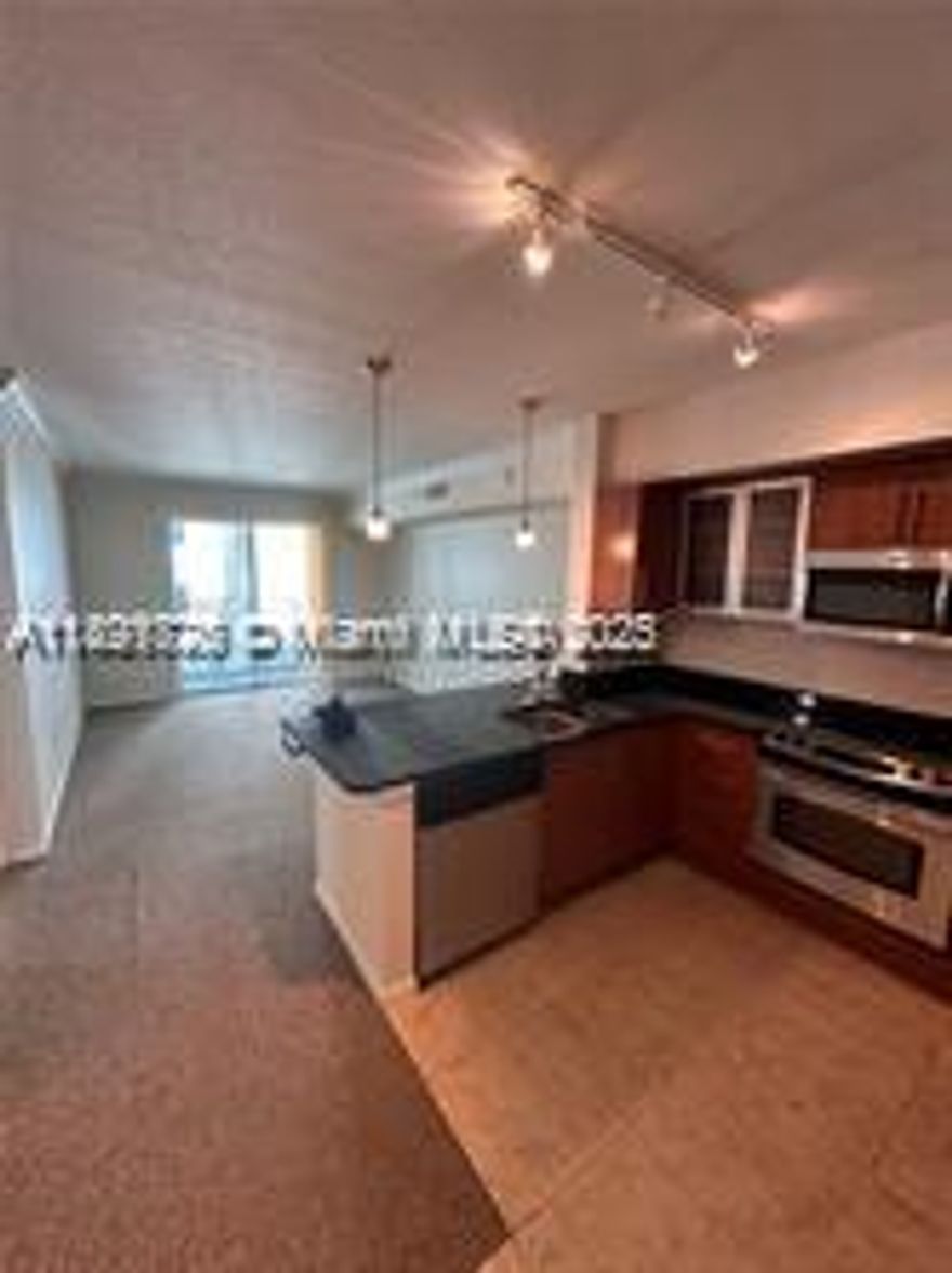 Cozy 1 bedroom, 1 bath with in unit washer and dryer in the center of downtown West Palm! Extra flex/den space for an office or dining table. The Prado offers walkability to all downtown & Palm Beach entertainment & dining! The building features 24 hour lobby security, gated parking garage, resort style pool, fitness center and club room. Water, sewer & trash included in the rent. Drive 5 minutes to the beach!