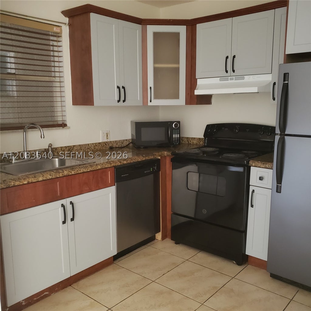 Photo of 1300 Moffett St #110, Hallandale Beach, FL 33009 (MLS # A12083540)