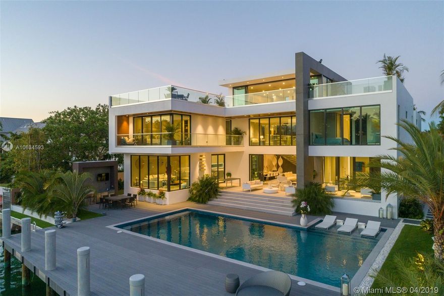 Gorgeous waterfront estate offering the ultimate level of luxury and perfection (2019). This 3 story contemporary masterpiece has been meticulously designed with exquisite architecture providing both comfort and elegance with spectacular top of the line finishes throughout. This magnificent home has very defined and open spaces with breathtaking and astonishing views of the harbor and bay. This dream residence offers an incredible infinity pool & terrace overlooking the harbor, 7 bed, 8 full baths and 1 powder room, high ceilings throughout, floor to ceiling glass windows & doors, stainless steel state-off-the-art appliances, BBQ area and on the 3rd level you will find a stunning  family room, bar and huge terrace where you can enjoy and entertain family and friends. Boaters paradise.