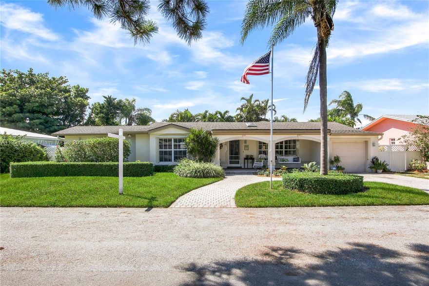 Welcome to paradise when you enter this Key West style home in Juno Beach (8000+ sq. ft. lot).  Just minutes to the Atlantic Ocean but still 30 ft. above sea level.  Move right in or add a 2nd level to capture the grand views of paradise (currently a 2nd level deck). Many upgrades in this special home including (but not limited to) remodeled kitchen with granite counters, custom cabinetry, eat in breakfast nook & center island. Hardwood floors throughout, renovated master suite bath with french doors leading to the gorgeous gardens. The backyard is a tropical oasis with beautiful landscaping to enjoy the So. Florida weather. You can also relax on the roof top deck and watch sunrises or sunsets. NO HOA'S  Just minutes to the beach, A-rated schools, recreational facilities,  (see supplement)