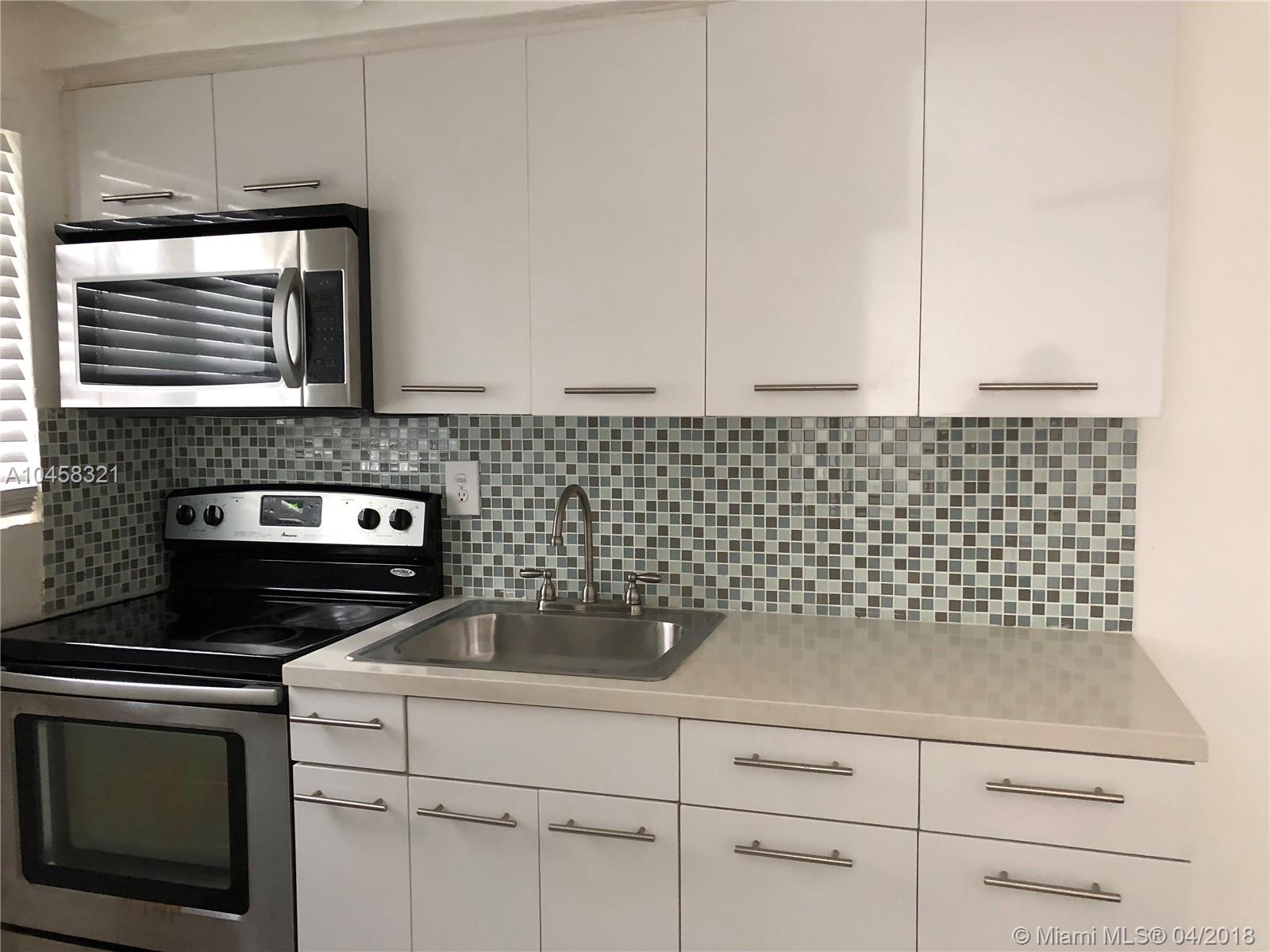 VERY EASY TO SHOW. VERY QUICK APPROVAL MOVE IN WITHIN 24H. NO ASSOCIATION. SUPERB LOCATION FEW SETPS TO LINCOLN RD RIGHT NEXT TO COLONY THEATER. VEY CHARMING 1 BED 1 BATH RENOVATED WITH UPDATED WHITE KICHEN WITH QUARTZ COUNTERTOP, AND SS APPLIANCES. UPDATED BATHROOM, WITH A SHOWER SYSTEM, REFINISHED OLD FLORIDA PINE WOOD FLOORS, HURRICANE IMPACT WINDOWS AND THRU THE WALL AC UNITS. APT HAS 2 LARGE CLOSET SPACE. QUIET BUILDING WITH A LOT OF CHARM . CCTV CAMERA, CONTROLLED ACCESS AND LAUNDRY ON SITE
