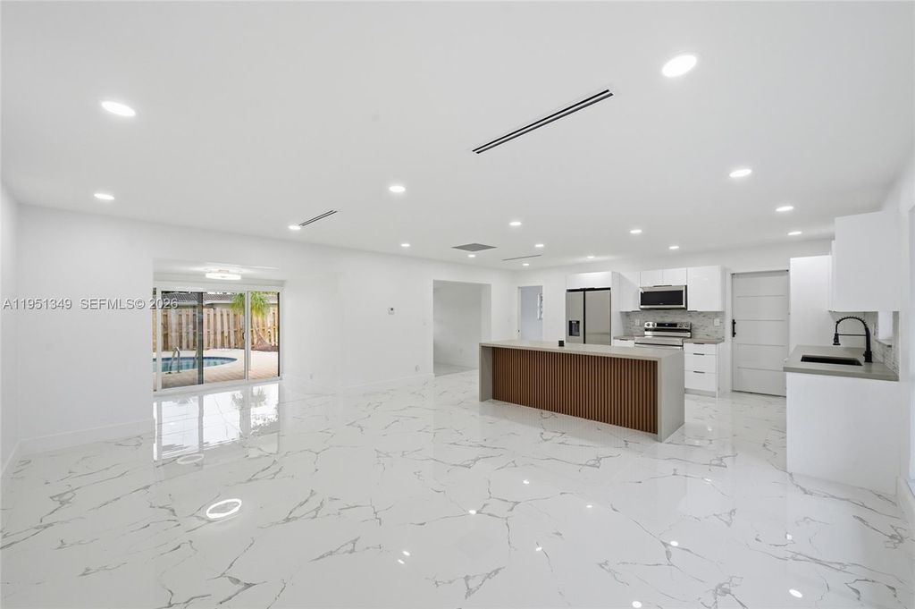 Photo of 4711 NE 18th Ave, Oakland Park, FL 33334 (MLS # A11951349)