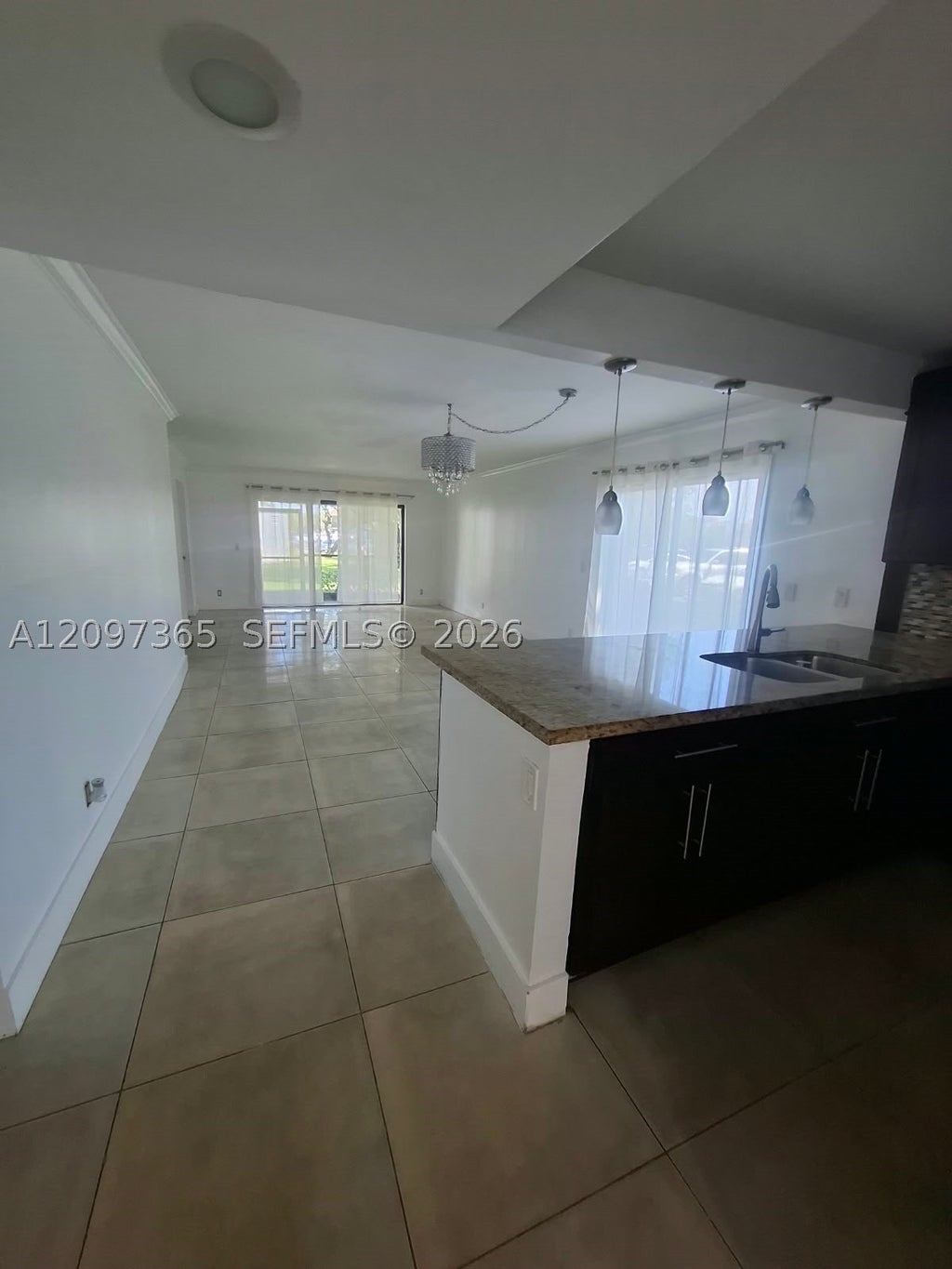 Photo of 320 Racquet Club Rd #104, Weston, FL 33326 (MLS # A12097365)