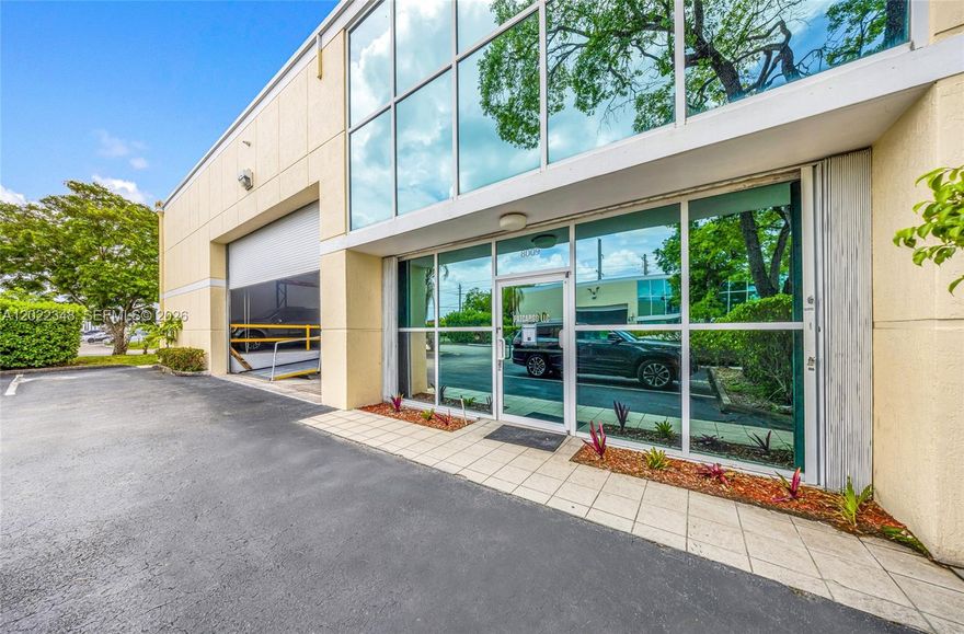 Prime Location! Exceptional opportunity to own a move in ready warehouse ideally positioned just off NW 82nd Avenue in the heart of Doral, less than 2 miles from Miami International Airport. This ±5,000 SF corner unit
features 19’ clear height, two recessed dock loading positions, and a 14’H x 22’W motorized roll up door. The
property offers a welcoming reception area and an elegant second floor office with floor to ceiling windows and
great views. Additional features include two restrooms, six assigned parking spaces and the ability to
accommodate up to 10 vehicles. The office area has been upgraded with new flooring, creating a modern, turnkey
workspace. As an end unit, the property benefits from excellent visibility, convenient access, and efficient
maneuverability. The roof was completed in 2022, and the building has successfully passed its 30 year
recertification. A metal ramp adds functionality, while the potential for prominent exposure makes this an ideal
opportunity for businesses seeking both visibility and accessibility. Easy access to all major highways completes
this outstanding offering. Contact listing agents to schedule a tour!