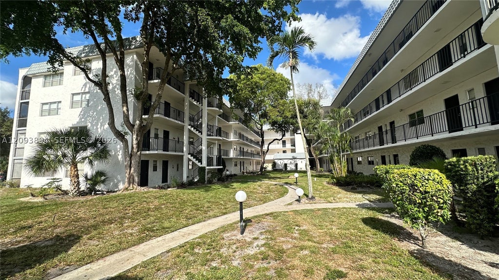 Photo of 3360 Spanish Moss Ter #403, Lauderhill, FL 33319 (MLS # A12093894)