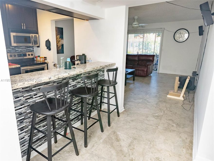 Welcome to this 2-bedroom, 2-bath condo located on the second floor of a charming three-story building within a well-maintained community of just 76 units. Enjoy peaceful water and garden views throughout the complex, along with access to a community clubhouse and pool—perfect for relaxing or socializing.

This pet-friendly community offers open assigned parking plus ample guest parking, making everyday living and entertaining easy. The villas feature newer roofs and the buildings were recently painted, giving the community a fresh, updated feel. Conveniently located within walking distance to A-rated schools and the new CVS on Sample Road, and surrounded by new home construction and the Coral Springs Country Club tower, this location continues to grow in value. The condo is listed As-Is and includes all appliances, newer carpet, and a spacious breakfast bar—perfect for enjoying your morning coffee or adding separation to the living space.
A great opportunity for comfortable living or investment in a desirable Coral Springs location.