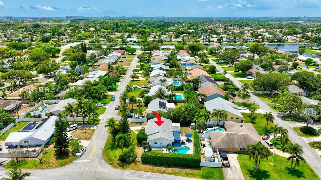 Photo of 654 Bunting Dr, Delray Beach, FL 33444 (MLS # A12094599)