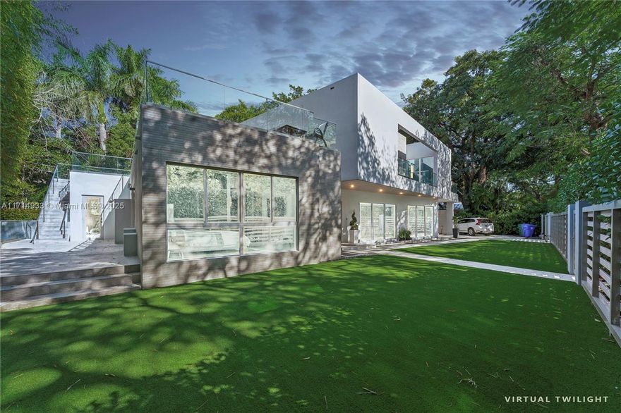 Indulge in the Pinnacle of Luxury Living in this contemporary estate nestled in the heart of South Coconut Grove. This majestic residence, boasting 5 beds, 6 baths, is set on an expansive ~11,000 sq ft lot, offering boundless opportunities for both refined indoor and outdoor experiences. Step inside to experience an automated home equipped with technology and premium quality materials. The gourmet Italian kitchen is a culinary haven, panoramic sliding doors seamlessly merge indoor & outdoor spaces, perfect for sophisticated entertaining. An outdoor kitchen, complete with every amenity. Strategically located near top-tier restaurants, shopping & transportation, this extraordinary property is a true gem of luxury living.